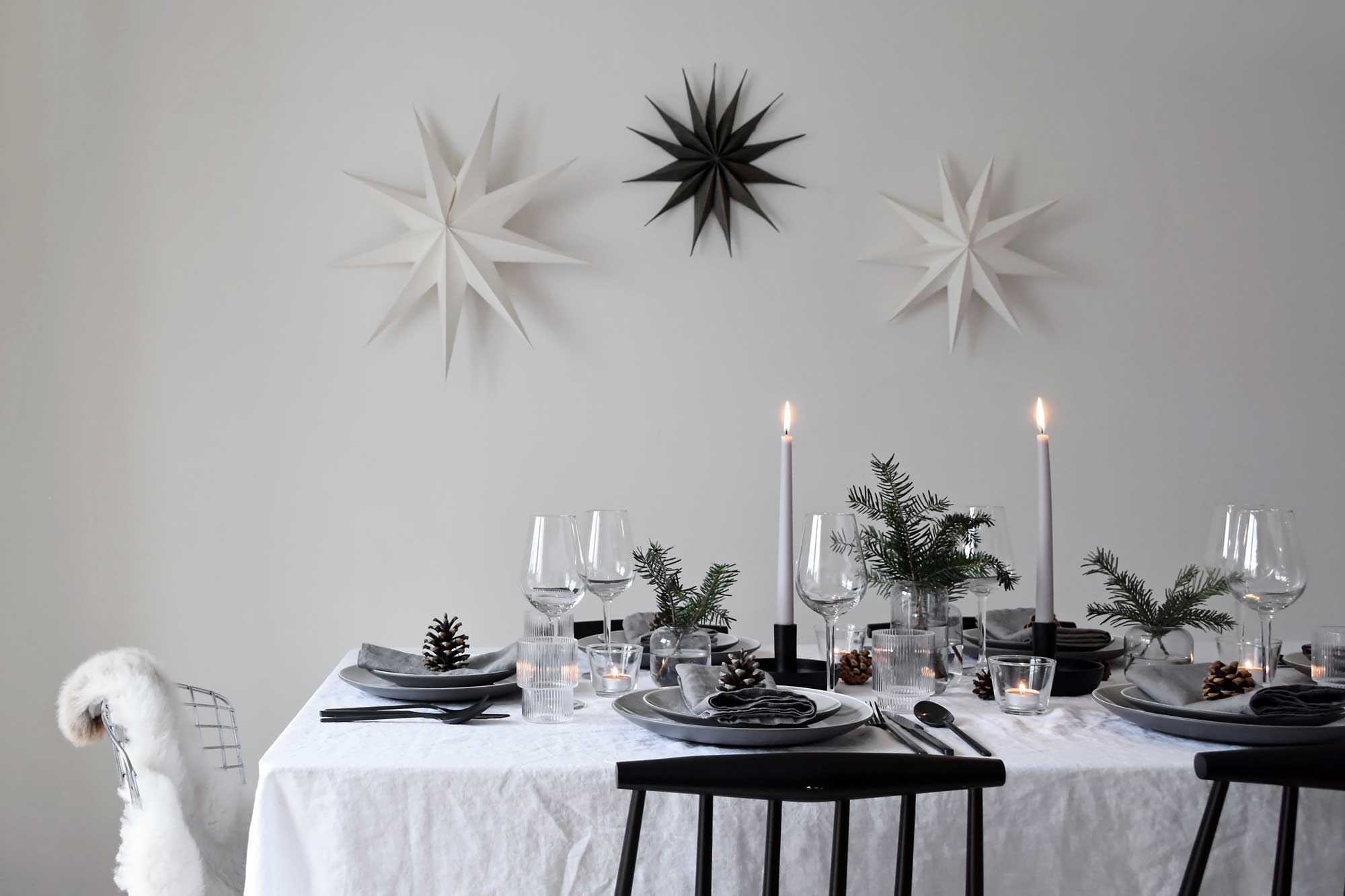 Minimalist Christmas table styling with fir, candles & pine cones | These Four Walls blog